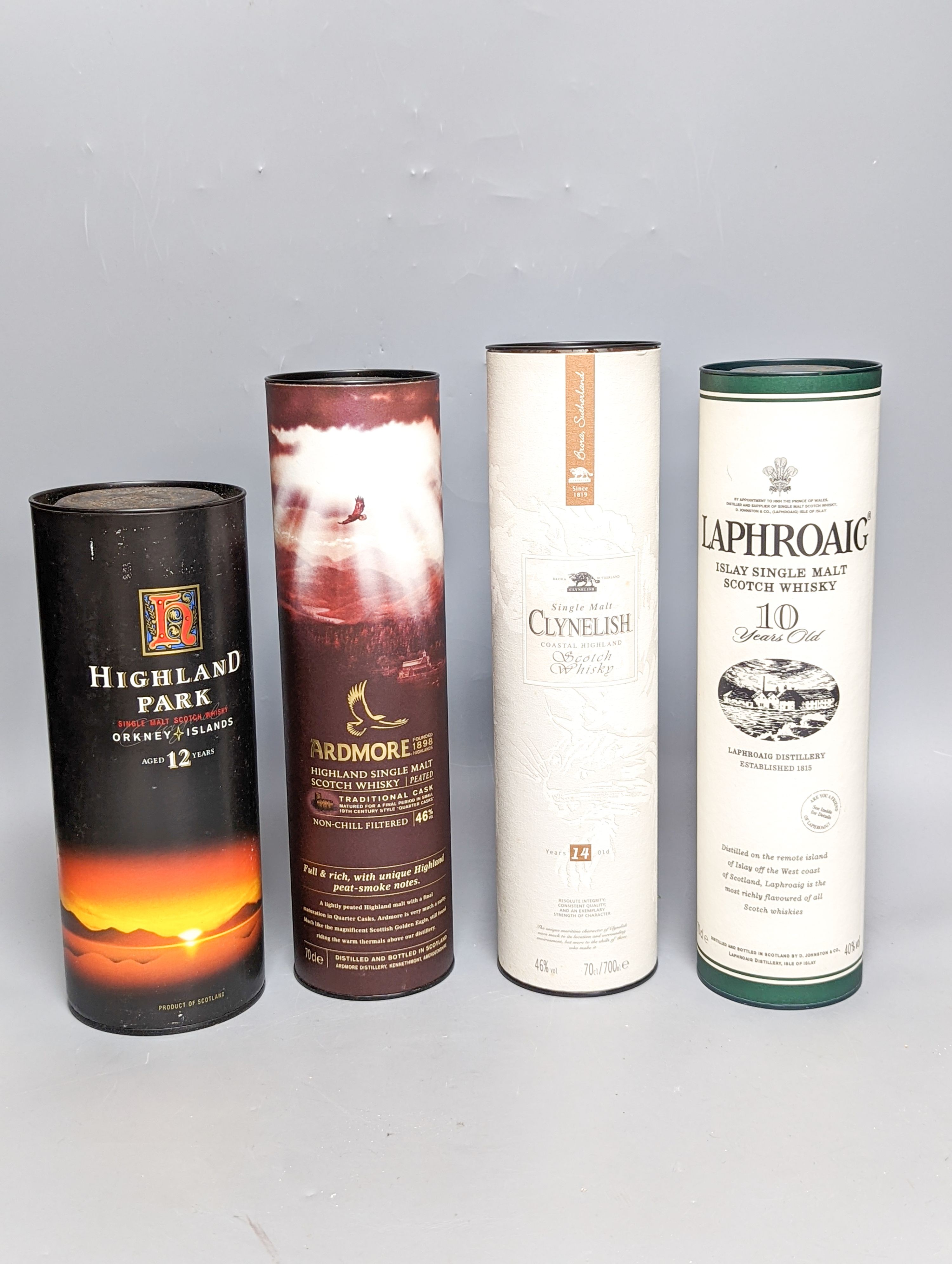 Four assorted single malt whiskies including Laphroaig 10 year old, Ardmore, Clynelish 14 year old and Highland Park aged 12 years, all boxed.